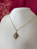 The “Cross Of The Pearl” Necklace