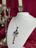 The “crucifixion” necklace